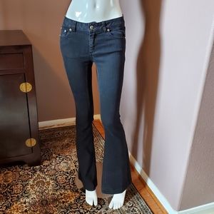 CACHÉ black flare jeans size 0